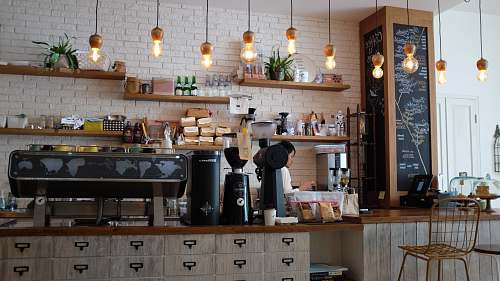 coffee shop black kitchen appliance on kitchen island with pendant lights cafe